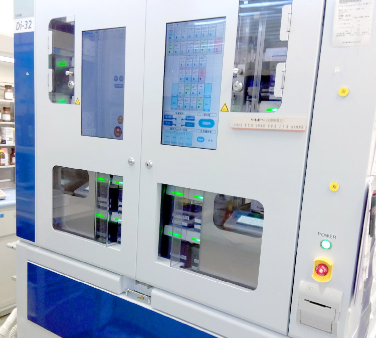 散剤自動秤量分包機